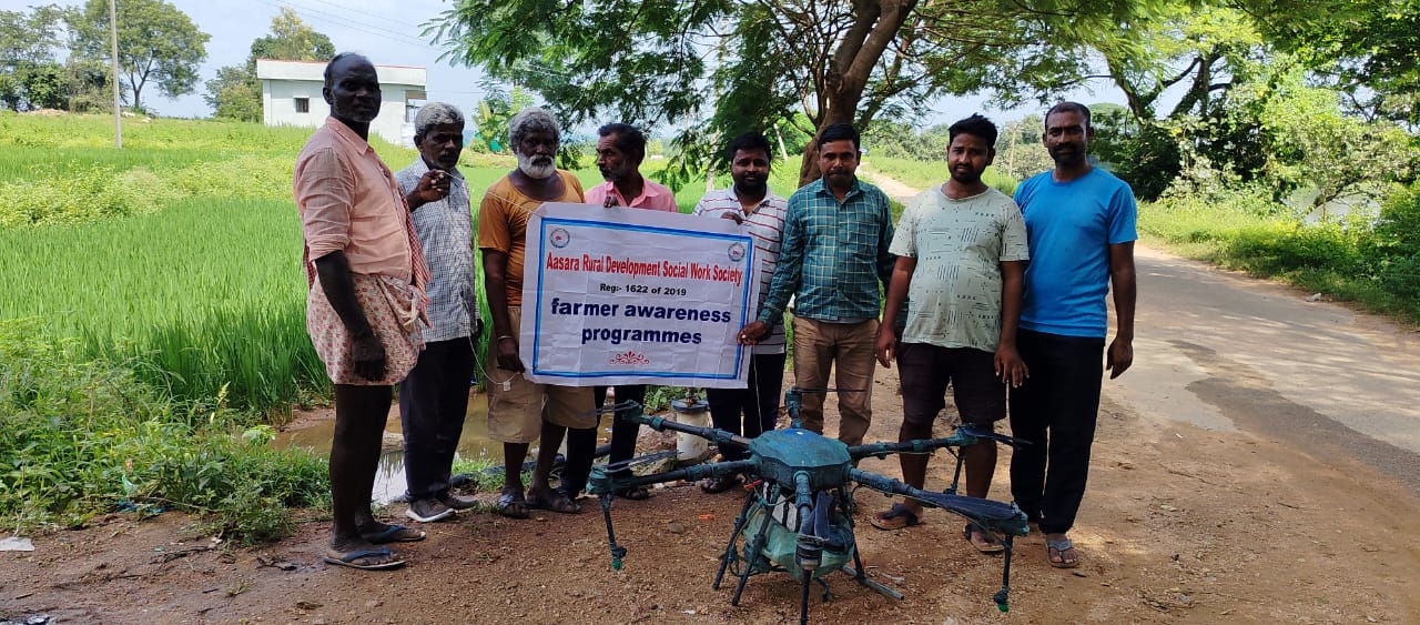 Farmers learning to use an agricultural spray drone